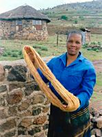 Mosotho woman holding spun mohair